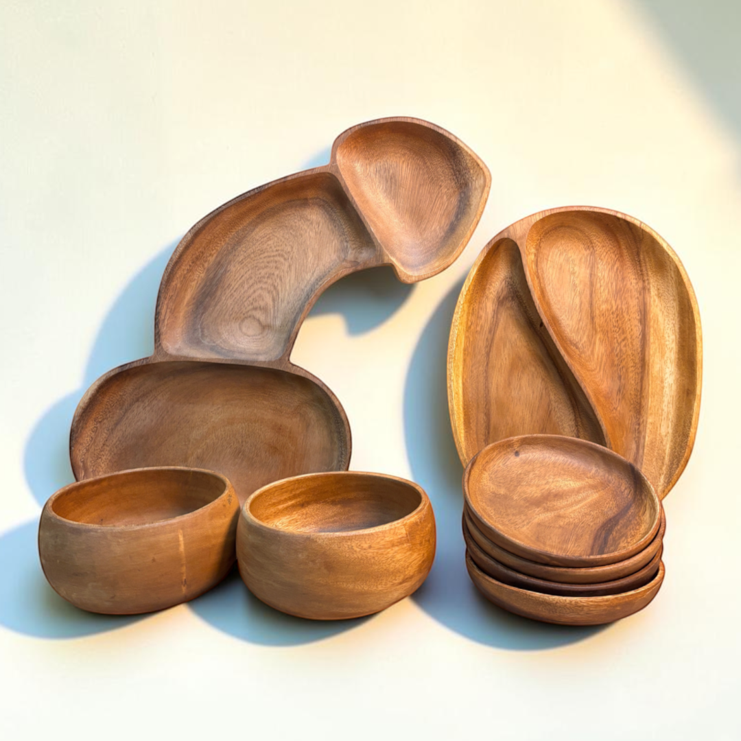 Marai Home Party Starter Bundle featuring acacia wood serving boards, a YinYang platter, bowls, and small round plates.