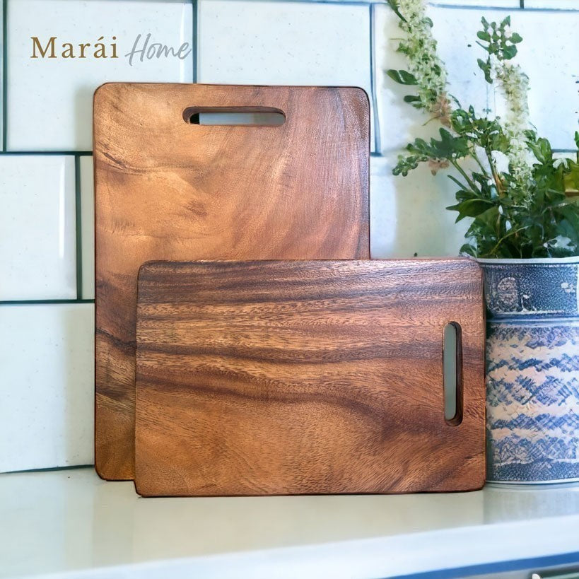 Marai Home Classic Acacia Wood Chopping Board with handle slot, natural grain, perfect for prep or serving.