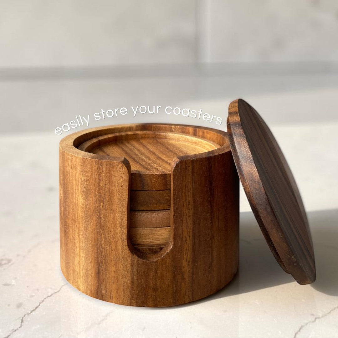 Marai Home handcrafted acacia wood coaster set with a round storage holder and matching lid on a white countertop