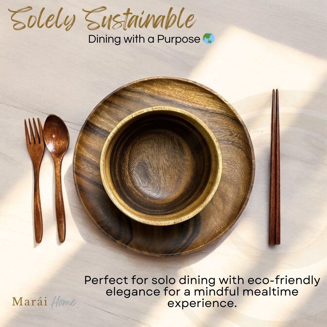 Marai Home Solely Sustainable acacia wood dining set including a round plate, soup bowl, fork, spoon, and chopsticks.