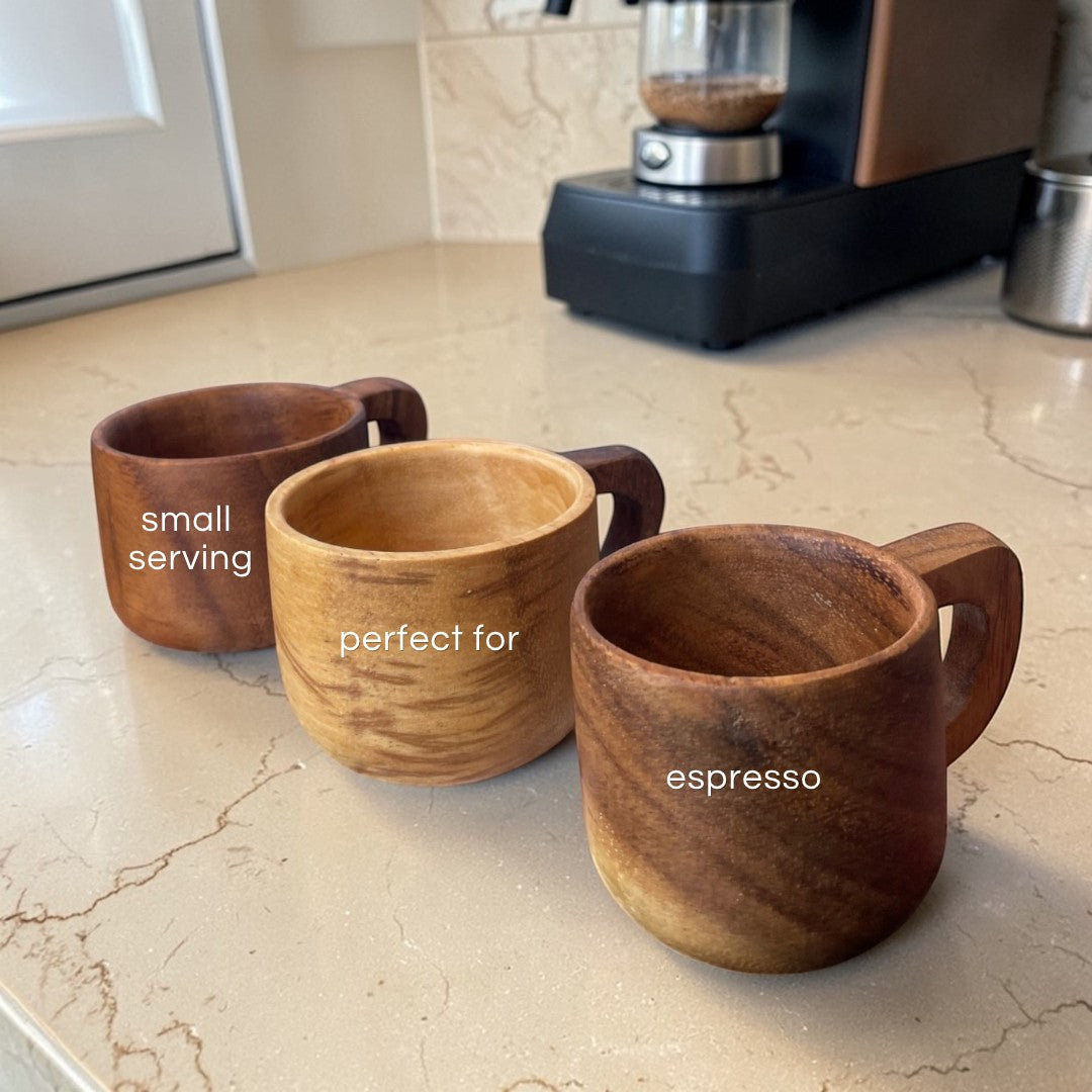 Marai Home three small acacia wood espresso cups with handles, natural wood grain, perfect for coffee and serving.