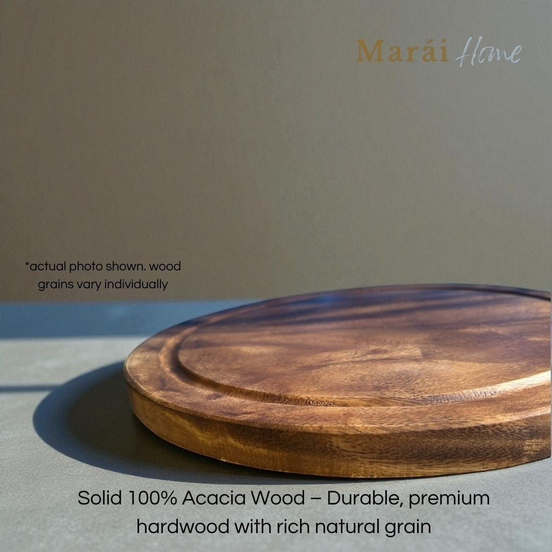 Marai Home round acacia wood pizza board with a groove for catching crumbs and a smooth, natural grain finish.
