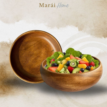 Marai Home handcrafted acacia wood salad bowl with natural grain patterns filled with fresh fruit and greens