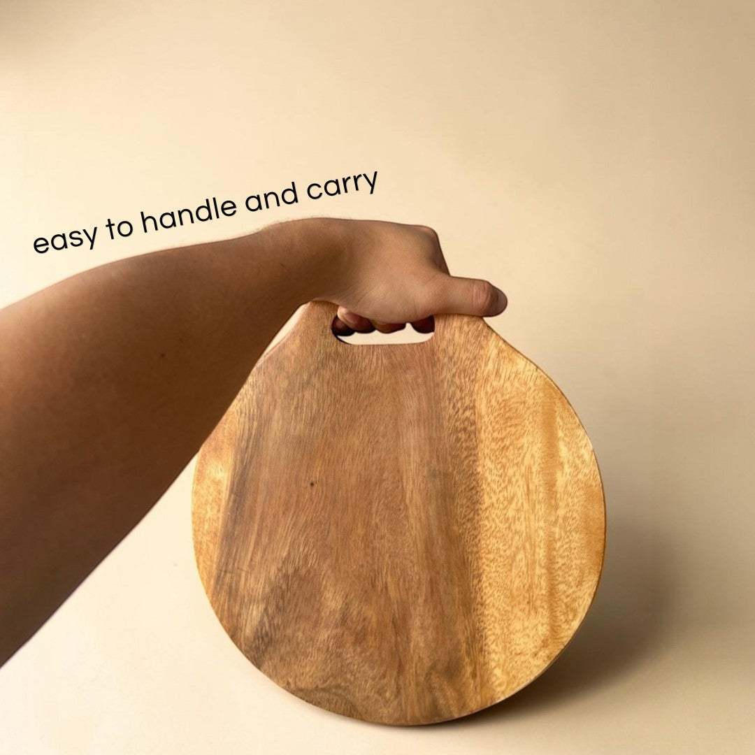 Marai Home Classic Round Acacia Wood Serving Board with handle, natural wood grain, perfect for cutting or serving.
