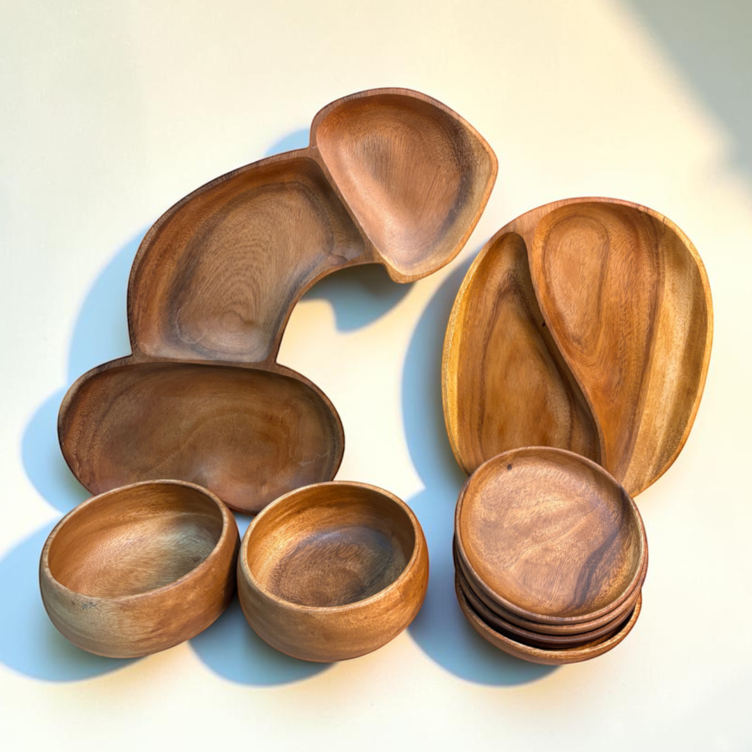 Marai Home Party Starter Bundle featuring acacia wood serving boards, a YinYang platter, bowls, and small plates.