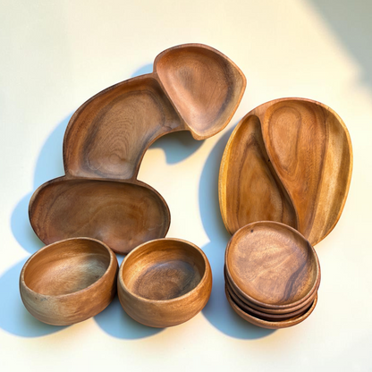 Marai Home Party Starter Bundle featuring acacia wood serving boards, a YinYang platter, bowls, and small plates.