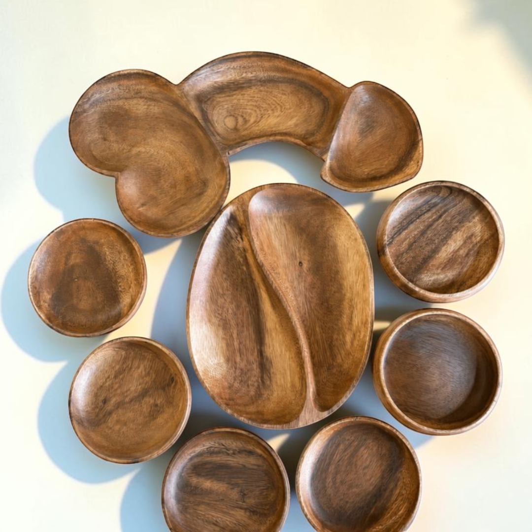 Marai Home Party Starter Bundle featuring acacia wood serving boards, a YinYang platter, round plates, and bowls.