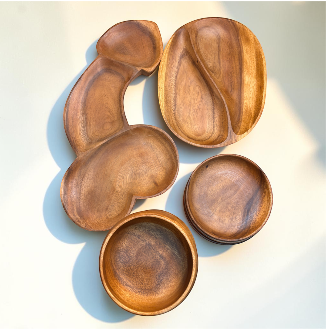 Marai Home Party Starter Bundle featuring acacia wood serving boards, a YinYang platter, round plates, and bowls.