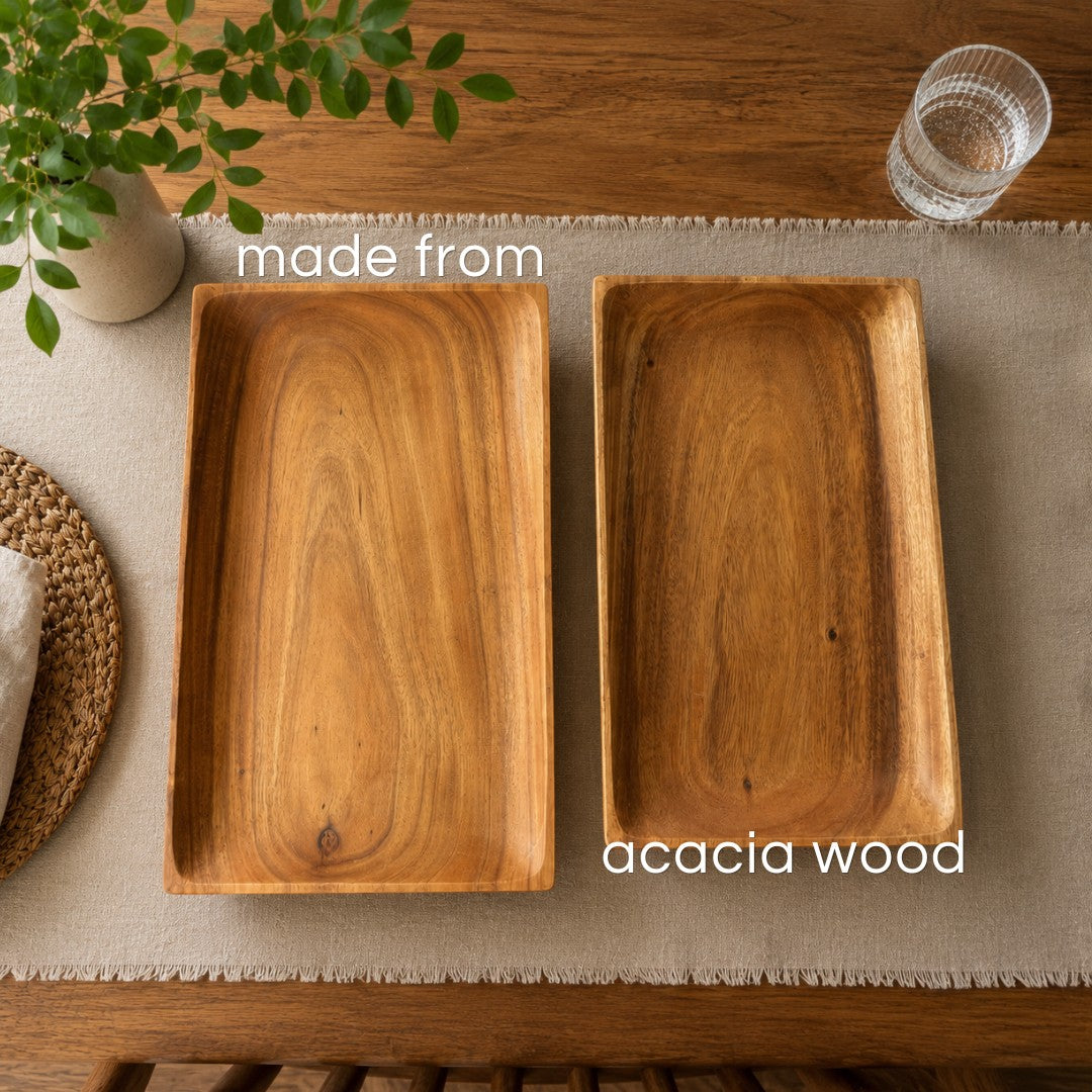 Marai Home rectangular serving trays made from natural acacia wood with visible grain on a dining table