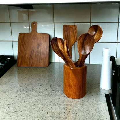 Marai Home 6-piece acacia wood utensil set with holder, including spatula and ladle, on a kitchen counter.